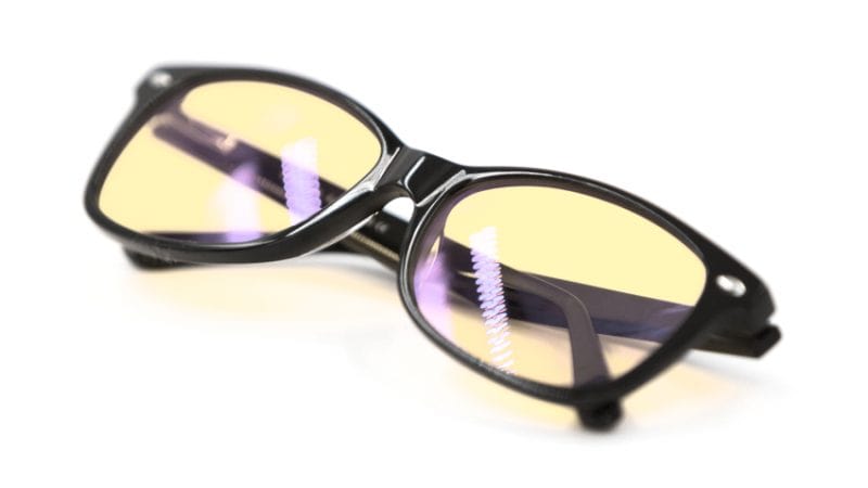 A pair of glasses with yellow mirror lenses